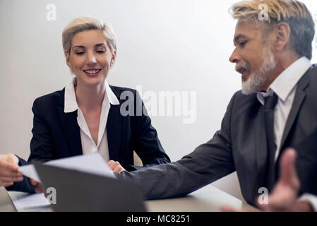 Financial advisor talking to client Stock Photo