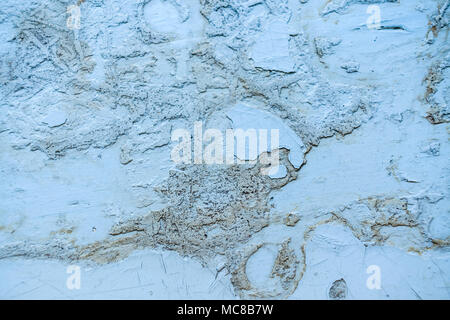 Grey grunge shabby wooden background with pieces paint and putty with soft focus. Stock Photo