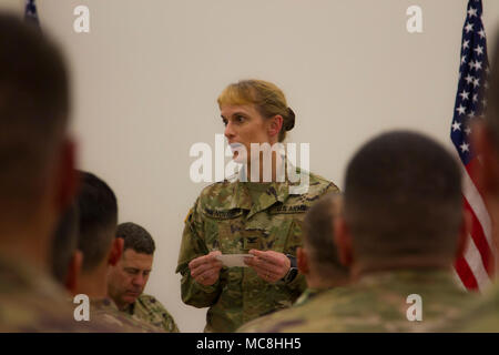 US Army Col. Jean Henderson, commander of the 505th Theatre Tactical Signal Brigade, speaks to her Soldiers of the 319th Expeditionary Signal Battalion, 505th Signal Brigade, 335th Signal Command [Theater], on the various accomplishments they made while deployed at North Fort Hood, Texas, on March 24, 2018. The soldiers of 319 ESB worked for a year to enhance communications and train alongside America’s Allies across US Africa Command. Stock Photo