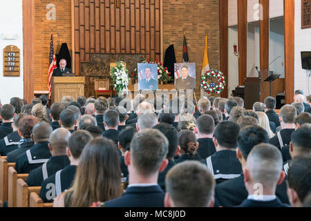 VIRGINIA BEACH, Va. (March 30, 2018) Rear Adm. Roy Kelley, commander of Naval Air Force Atlantic, addresses friends, family and squadron mates from Strike Fighter Squadron (VFA) 213 and Helicopter Sea Combat Squadron (HSC) 26 at a memorial service for Lt. Cmdr. James Brice Johnson and Lt. Caleb King. Johnson and King lost their lives in an F/A-18F Super Hornet mishap that occured just outside Naval Air Station Key West on March 14, 2018. Stock Photo