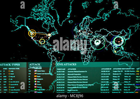 Real-time cyber attacks, including information on the attack's origin, type and target, as well as, the attacker's IP address, geographic location and ports being utilized, are displayed on the Norse attack map on the 275th Cyberspace Squadron's operations floor, known as the Hunter's Den. The squadron is one of four squadrons compromising the 175th Cyberspace Operations Group of the Maryland Air National Guard at Warfield Air National Guard Base, Middle River, Md., June 3, 2017. Stock Photo