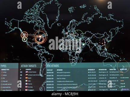 Real-time cyber attacks, including information on the attack's origin, type and target, as well as, the attacker's IP address, geographic location and ports being utilized, are displayed on the Norse attack map on the 275th Cyberspace Squadron's operations floor, known as the Hunter's Den. The squadron is one of four squadrons compromising the 175th Cyberspace Operations Group of the Maryland Air National Guard at Warfield Air National Guard Base, Middle River, Md., Dec. 2, 2017. Stock Photo