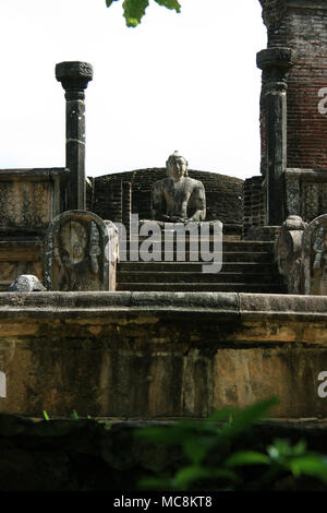 Sitting Buddha in the Vatadage of the royal ancient city of Polonnaruwa in Sri Lanka Stock Photo