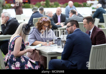 Racegoers during Grand National Day of the 2018 Randox Health Grand National Festival at Aintree Racecourse, Liverpool. Stock Photo