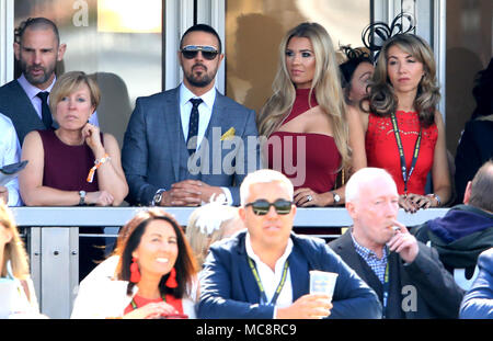 Paddy McGuinness and his wife Christine McGuinness watch the action during Grand National Day of the 2018 Randox Health Grand National Festival at Aintree Racecourse, Liverpool. Stock Photo