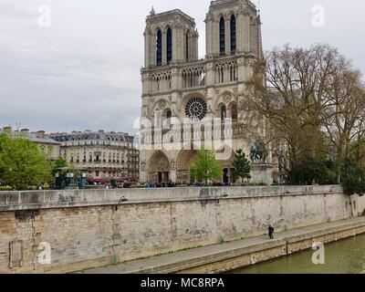 Crowds of tourists in front of Notre Dame Cathedral. Paris, France. Stock Photo