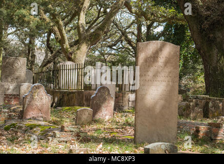 Headstones in the historic graveyard at Beaufort, North Carolina. Monochrome and color. Ghosts, goblins, and serenity all in one place! Stock Photo