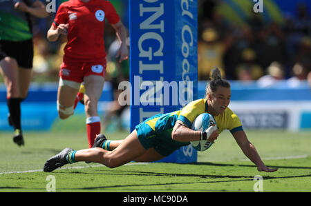 Australia's Emma Tonegato scores a try during the Women's Rugby Sevens semi final against Canada at the Robina Stadium during day eleven of the 2018 Commonwealth Games in the Gold Coast, Australia Stock Photo