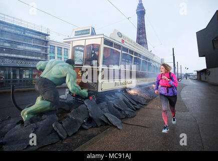 The Hulk stops traffic in Blackpool as he arrives with a bang in a groundbreaking stunt by Madame Tussauds Blackpool.  The spectacular scene which saw the green Avenger appear to dramatically stop a vintage tram in its tracks was created by Madame Tussauds Blackpool to mark the launch of the new Marvel Superheroes area, where The Hulk will be joined by his fellow Avengers Thor and Spider-man among others in a £1million, 5,501 square foot addition to the popular attraction, which opens next Friday (23March18).  Featuring: The Hulk Where: Blackpool, United Kingdom When: 15 Mar 2018 Credit: Joe P Stock Photo