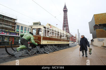 The Hulk stops traffic in Blackpool as he arrives with a bang in a groundbreaking stunt by Madame Tussauds Blackpool.  The spectacular scene which saw the green Avenger appear to dramatically stop a vintage tram in its tracks was created by Madame Tussauds Blackpool to mark the launch of the new Marvel Superheroes area, where The Hulk will be joined by his fellow Avengers Thor and Spider-man among others in a £1million, 5,501 square foot addition to the popular attraction, which opens next Friday (23March18).  Featuring: The Hulk Where: Blackpool, United Kingdom When: 15 Mar 2018 Credit: Joe P Stock Photo