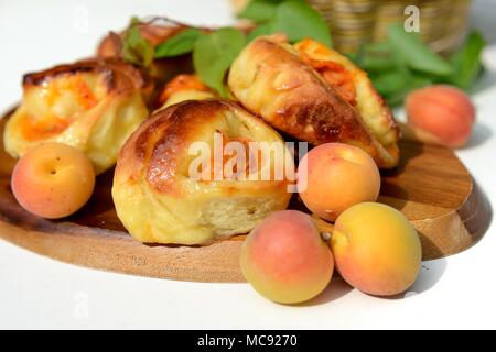 Buns made from yeast dough with apricot Stock Photo
