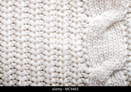 Knitted texture. Pattern fabric made of wool. Background, copy space. Stock Photo