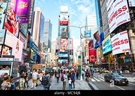 New York City, United States - November 2, 2017:   City life in Times Square at daytime. Stock Photo
