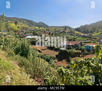 Horizontal panoramic view of a small village in the tea plantations in Nuwara Eliya, Sri Lanka. Stock Photo