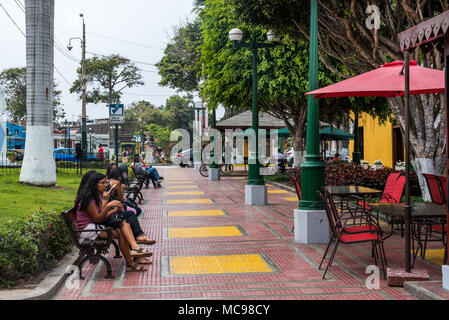 Lima, Peru -- April 13, 2018. Peruvians go about thier business in the bustling  Barranco District. Editorial use only. Stock Photo