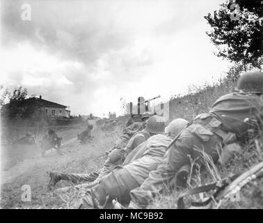 Bazooka, Soldier firing an M1 'Bazooka'. Portable recoilless anti-tank rocket launcher weapon, widely fielded by the United States Army. Stock Photo