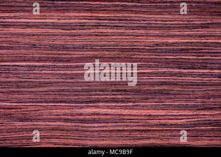 Texture of red rosewood veneer, seamless. Stock Photo