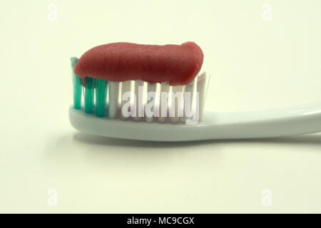 toothpaste toothbrush isolated single striped studio white Stock Photo