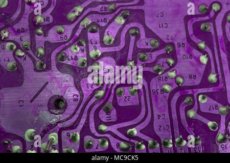 Conductive tracks on the motherboard of Printed Circuit Board close macro Stock Photo