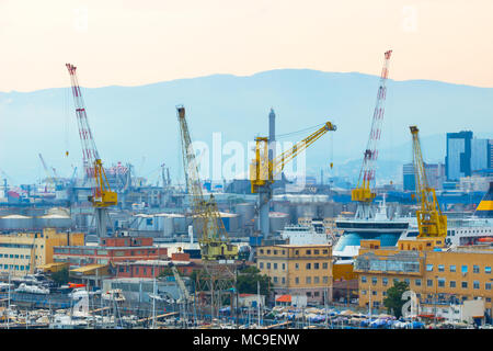 Large construction site including several cranes working on a building complex import export and business logistic by crane trade port ,shipping,cargo Stock Photo