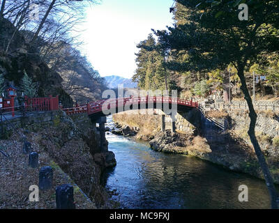 Famous red Shinkyo wooden bridge in Nikko Japan Stock Photo