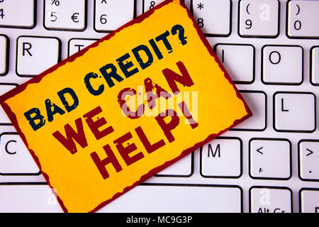 Handwriting text writing Bad Credit Question We Can Help Motivational Call. Concept meaning achieve good debt health written Sticky note paper placed  Stock Photo