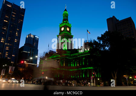 Light moving of bustling city center scene with old clock tower in Sydney Stock Photo