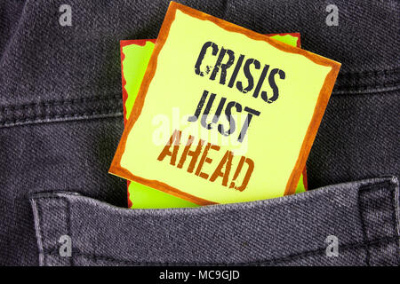 Handwriting text writing Crisis Just Ahead. Concept meaning Foresee failure take right action before it is late written Sticky Note Paper placed the J Stock Photo