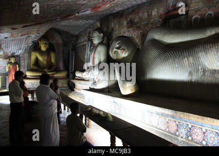 Reclining Buddha Statue in the Cave Temple in Dambulla, Sri Lankan Stock Photo
