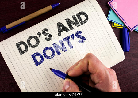 Conceptual hand writing showing Do'S And Don'Ts. Business photo showcasing What can be done and what cannot be knowing right wrong written by Man Note Stock Photo