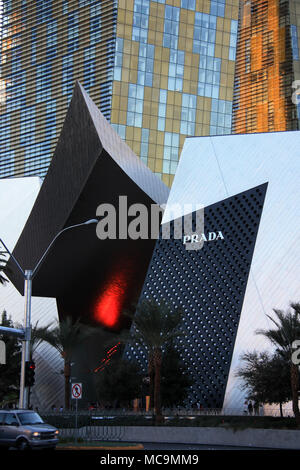Exterior view of the stunning architecture of the front entrance to The Shops at Crystals with the Veer Towers in the background, Las Vegas, NV, USA Stock Photo