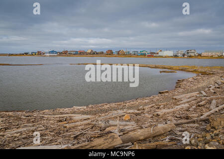 The hamlet of Tuktoyaktuk along the eroding shoreline of the Arctic Ocean, Northwest Territories,Canada, where sea ice is melting at an alarming rate. Stock Photo