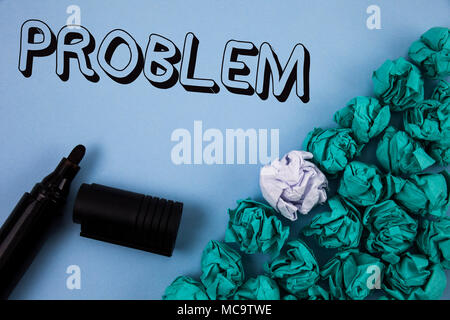 Handwriting text Problem. Concept meaning Trouble that need to be solved Difficult Situation Complication written Plain Blue background Crumpled Paper Stock Photo