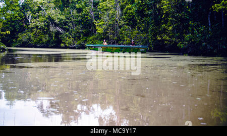 Kinabatangan, Malaysia - 09 May 2013 : Tourists on a boat cruise along the river of Kinabatangan, some of the most diverse concentration of wildlife i Stock Photo