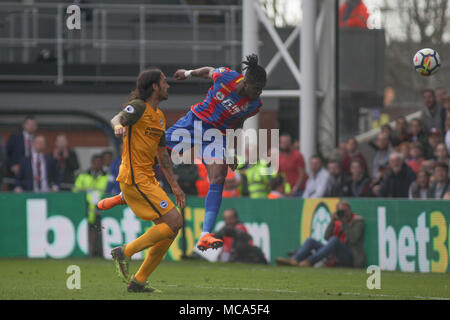 London, UK, 14 April 2018. Wilfried Zaha of Crystal Palace score his teams 3rd goal of the game .Premier League match, Crystal Palace v Brighton & Hove Albion at Selhurst Park in London on Saturday 14th April 2018.   pic by Kieran Clarke/Andrew Orchard sports photography/Alamy Live newsEditorial use only, license required for commercial use. No use in betting, games or a single club/league/player publications Editorial use only, license required for commercial use. No use in betting, games or a single club/league/player publications Credit: Andrew Orchard sports photography/Alamy Live News Stock Photo