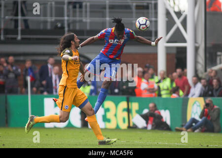 London, UK, 14 April 2018. Wilfried Zaha of Crystal Palace Scores his teams 3rd goal of the game. Premier League match, Crystal Palace v Brighton & Hove Albion at Selhurst Park in London on Saturday 14th April 2018.   pic by Kieran Clarke/Andrew Orchard sports photography/Alamy Live newsEditorial use only, license required for commercial use. No use in betting, games or a single club/league/player publications Editorial use only, license required for commercial use. No use in betting, games or a single club/league/player publications Credit: Andrew Orchard sports photography/Alamy Live News Stock Photo