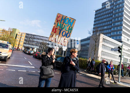 Berlin, Germany, 14 April 2018. 'How much is too much' is written on a sign during the demonstration under the motto 'resist rental madness'. More than 13,000 people demonstrated against 'repression and rent madness' in the capital. Credit: SOPA Images Limited/Alamy Live News Stock Photo