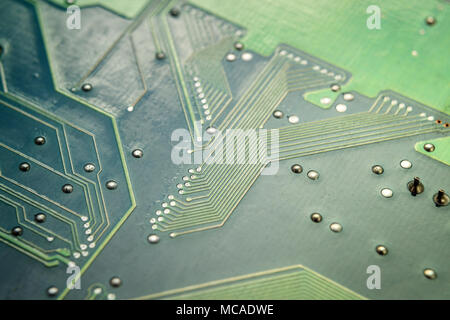 Chips, capacitors resistors on circuit board close up Stock Photo