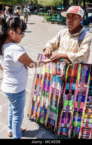 Mexico City,Hispanic,Coyoacan,Del Carmen,Jardin Centenario,plaza,man men male,girl girls,female kid kids child children,street vendor vendors sell sel Stock Photo