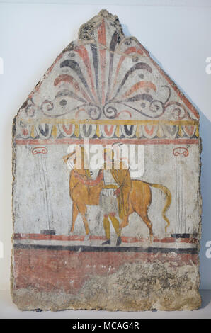 Return of the warrior depicted in the Lucanian fresco from 330-320 BC from the Tomb 114 of the Andriuolo Necropolis on display in the Paestum Archaeological Museum (Museo archeologico di Paestum) in Paestum, Campania, Italy. Stock Photo