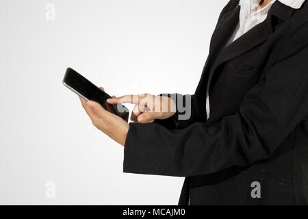 Businessmen and women are using mobile and touch smart phone isolated on white background Stock Photo