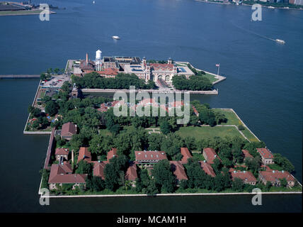 Ellis Island, in Upper New York Bay, was the gateway for millions of immigrants to the United States as the nation's busiest immigrant inspection station from 1892 until 1954. The island was greatly expanded with land reclamation between 1892 and 1934. Before that, the much smaller original island was the site of Fort Gibson and later a naval magazine. The island was made part of the Statue of Liberty National Monument in 1965, and has hosted a museum of immigration since 1990. Long considered part of New York, a 1998 United States Supreme Court decision found that most of the island is in New Stock Photo