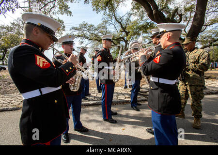 Marines with Marine Corps Band New Orleans prepare for the Krewe of Alla Mardi Gras parade, New Orleans, Feb. 4, 2018. Marine Corps Band New Orleans performs in multiple Mardi Gras parades annually to celebrate the Mardi Gras season and to show Marine Corps presence in the New Orleans Community Stock Photo