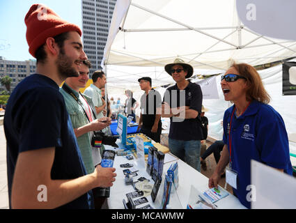 Los Angeles, USA. 14th Apr, 2018. People consult at a booth during the 'March for Science' Rally and Science Expo in Los Angeles, the United States, April 14, 2018. Credit: Li Ying/Xinhua/Alamy Live News Stock Photo