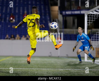 Annapolis, MD, USA. 14th Apr, 2018. Columbus Crew SC Defender #25 Harrison Afful tries to redirect a cross toward the goal during a MLS soccer match between the D.C. United and the Columbus Crew SC at Navy Marine Corp Memorial Stadium in Annapolis, MD. Justin Cooper/CSM/Alamy Live News Stock Photo