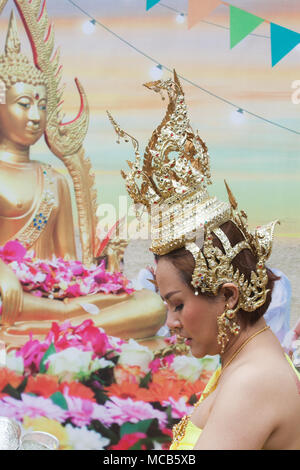 London UK. 15th April 2018. A Traditonal Thai dancer performs  at the Thai New Year (Songkran) at the Buddhapadipa Temple in Wimbledon, the largest Thai temple in the UK with religious ceremonies Thai classical music and dancing performances as well as stalls selling Thai food, groceries and souvenirs Stock Photo