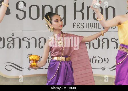 London UK. 15th April 2018.  Traditonal Thai dancers performs  at the Thai New Year (Songkran) at the Buddhapadipa Temple in Wimbledon, the largest Thai temple in the UK with religious ceremonies Thai classical music and dancing performances as well as stalls selling Thai food, groceries and souvenirs Stock Photo