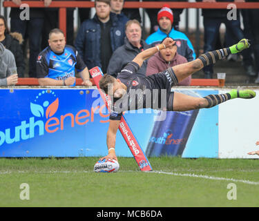 Catalans Dragons' Tom Makinson goes down injured during the Betfred ...