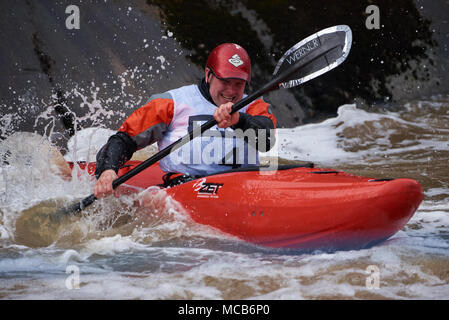 Helsinki, Finland. 15th April, 2018. Unidentified racer at the annual Icebreak 2018 whitewater kayaking competition at the Vanhankaupunginkoski rapids in Helsinki, Finland. Credit: Mikko Palonkorpi/Alamy Live News Stock Photo