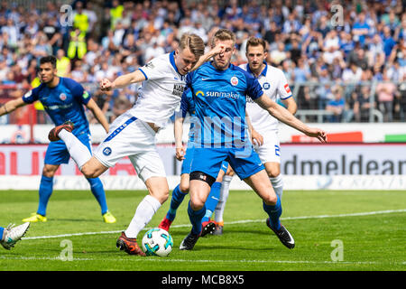 Marco Thiede (KSC) in duels with Oliver Huesing (FC Hansa). GES/Soccer/3rd league: Karlsruher SC - FC Hansa Rostock, 15.04.2018 Football/Soccer: 3rd League: Karlsruhe - Rostock, Karlsruhe, April 15, 2018 | usage worldwide Stock Photo